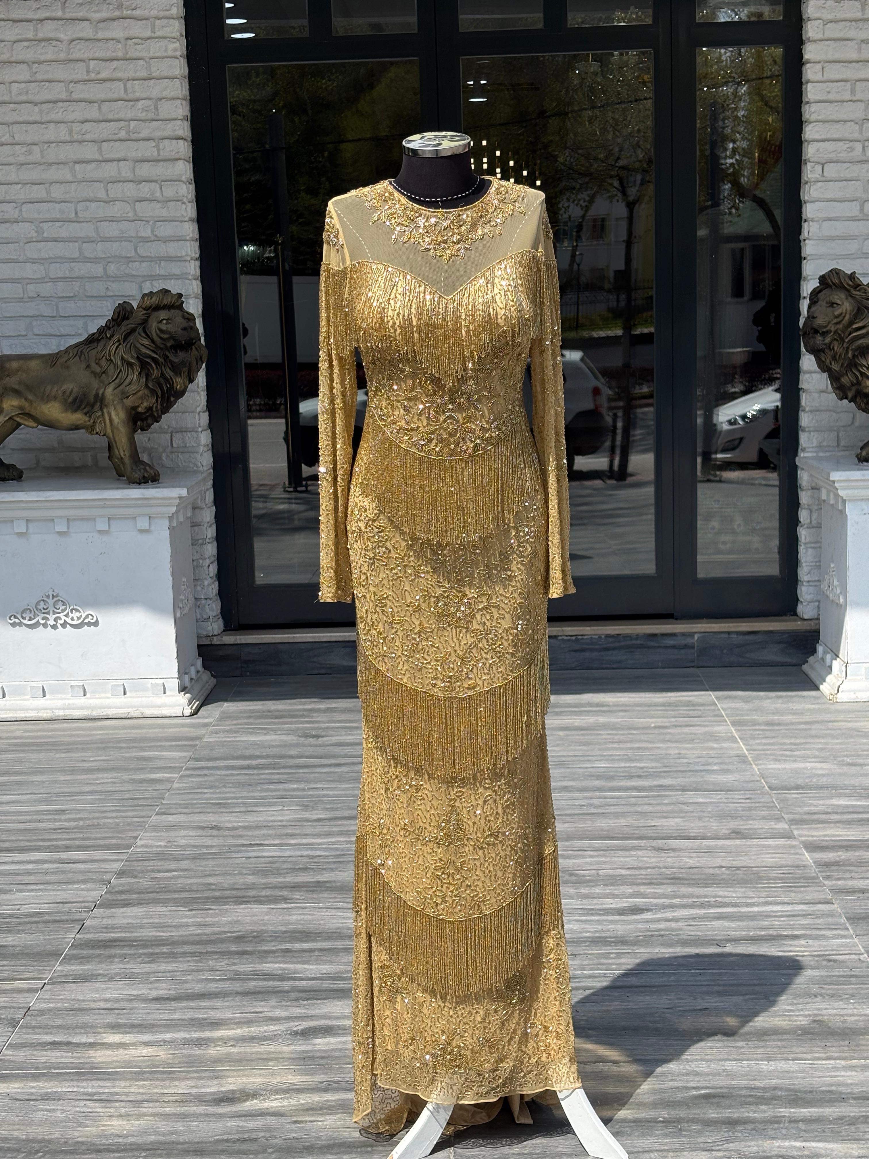 İthal Altın Renk El İşlemeli Abiye Uzun Püskül Detaylı Gece Elbisesi